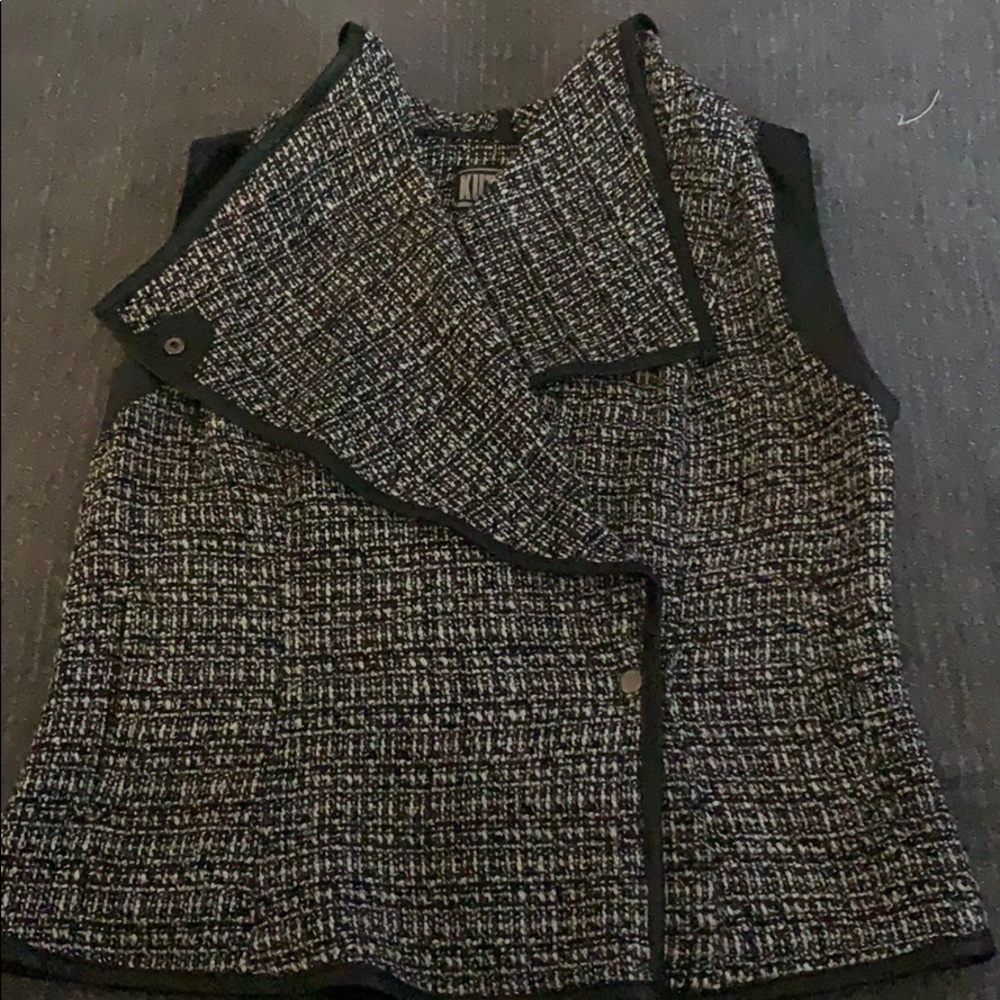 Black and white vest